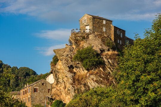 Corsican stone house on top of a rock in Pietra-di-Verde, a dreamy mountain village nestled in the mountains of Castagniccia, Corsica, France