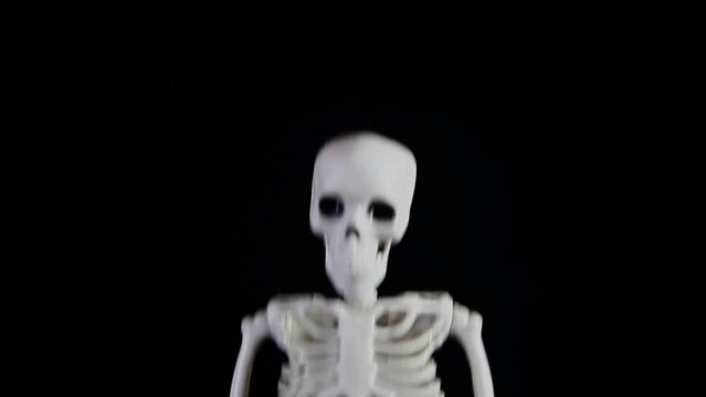 footage of sceleton dark background 