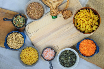 Various vegetarian organic products in bowls. Rural and farm view. Top view. Copy space.