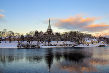 Fototapeta na wymiar River Nidelva and the Cathedral Nidarosdomen in the city Trondheim, Norway