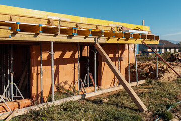 Formwork construction new house in progress at building site