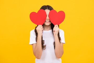 Happiness kids and love concept. Romantic lovely teen girl with red heart, world heart day, happy valentines day.