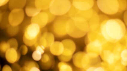 Christmas golden lights Background. Abstract twinkled bright bokeh defocused lights.