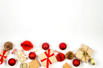 Christmas background with gift boxes red baubles and ribbon