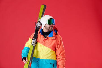 Young boy with winter clothing and skis