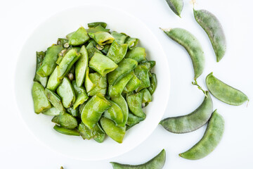 Fried lentils in a home-cooked dish on a white background