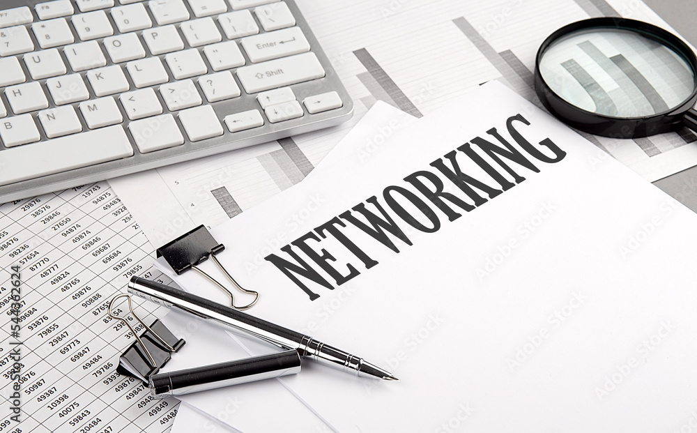 Poster networking text on paper with chart and keyboard, business concept