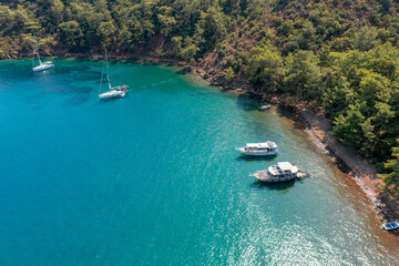 Turquoise sea and aerial view of boats at Ekincik bay. 