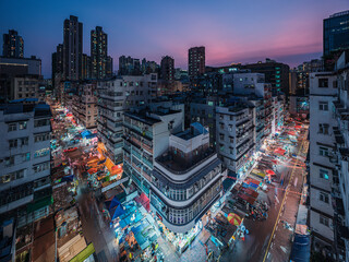 HONG KONG - July 28: Main street with many stalls in Sham Shui Po, Hong Kong on July 28, 2022. It...