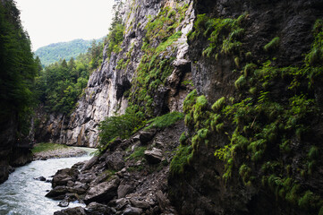Obraz premium Aareschlucht Gorge, Switzerland - 30 July 2022 , Aareschlucht Gorge formed for thousands of years by the Aare Glacier.