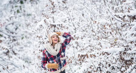 Christmas time. Winter outfit. Woman wear warm accessories stand in snowy nature. Winter fashion collection. Winter admirer. Favorite season. Walk in snowy forest. Happy girl having fun outdoors