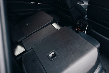 Luxury black car interior,seat of the second row of seats, climate control, air ducts, details interior. 