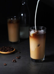 Cold coffee with ice in low key