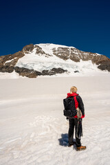 Fototapeta na wymiar A mountain hiker in the Swiss Alps