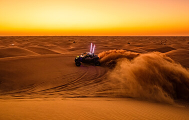Offroad safari in sand desert, Empty Quarter Desert in United Arab Emirates. Offroad buggy in dunes of Rub’ al Khali desert after sunset. - obrazy, fototapety, plakaty