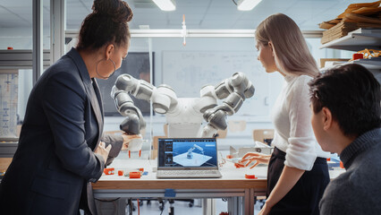 Black Professor Analyse and Discuss Futuristic Robotic Arm with Two Diverse Young Specialists in...