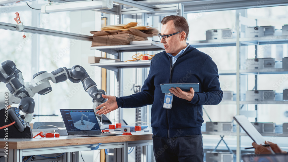 Poster In Robotics Development Laboratory: Future Engineers and Scientists Work on Automated Robotic Arm Prototype. Professional Entrepreneur Inspires People For New Technological Achievements.