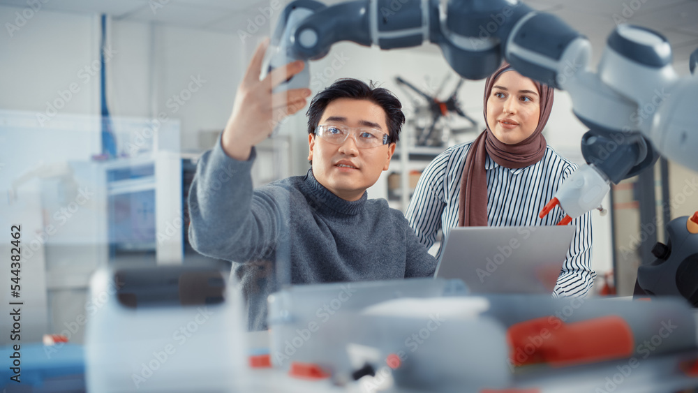 Poster arabic female future engineer looks at work of skilful developer. asian man explains core principles