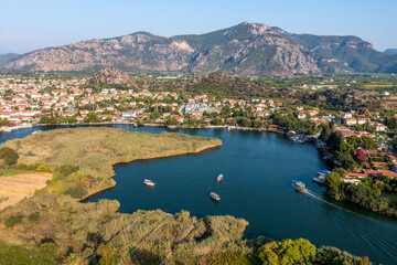 Aerial view of Dalyan river and boats with Iztuzu Beach Scenery, Turkey.