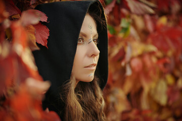 shaman in cloak