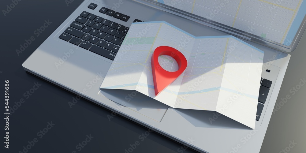 Poster map on a computer laptop. red pin pointer, gps navigation application.