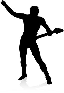 silhouette guitarist playing guitar