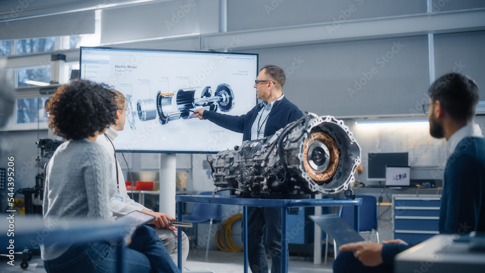 Aufkleber group of young scientists working: inspecting engine in factory meeting room. people brainstorming w