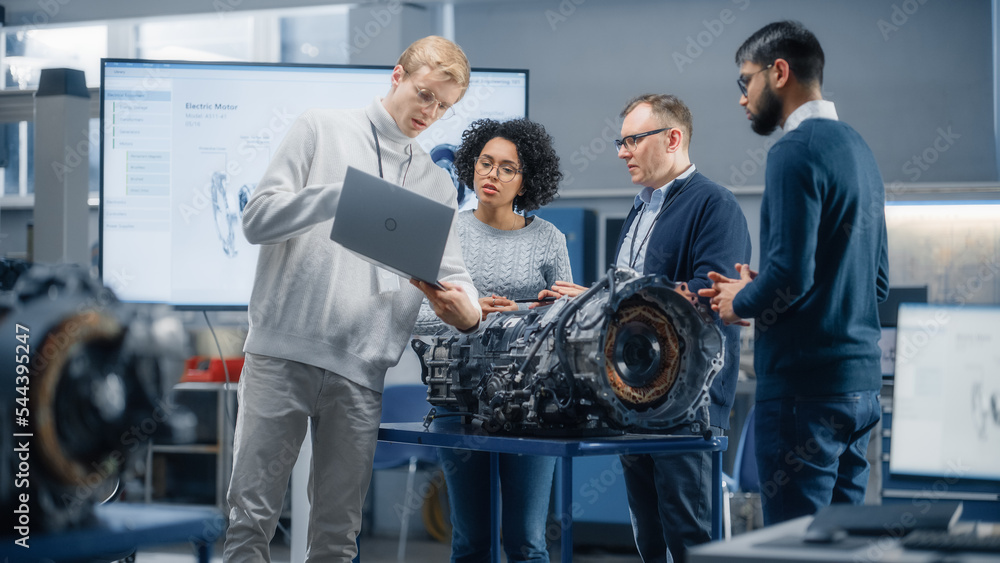 Poster diverse group of young specialists talk with chief engineer. professionals use laptop and working on
