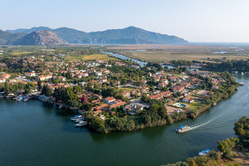 Aerial view of Dalyan river and boats with Iztuzu Beach Scenery, Turkey.