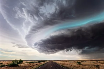Foto auf Alu-Dibond storm clouds over a road © JSirlin