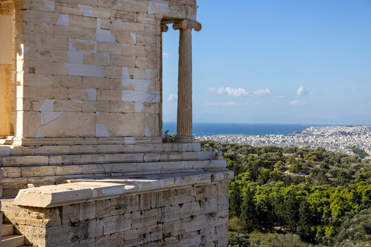 Temple of Athena Nike and aerial view of the city and sea with port of  Piraeus in the distance, Athens, Greece Stock Photo | Adobe Stock