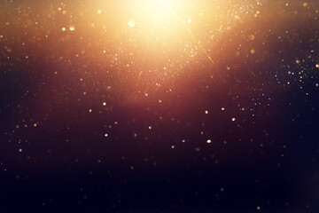 background of abstract glitter lights. gold and black. de focused - obrazy, fototapety, plakaty