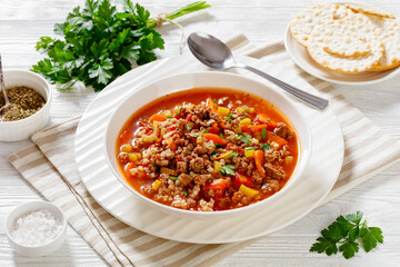 Hamburger Soup with barley and vegetables in bowl