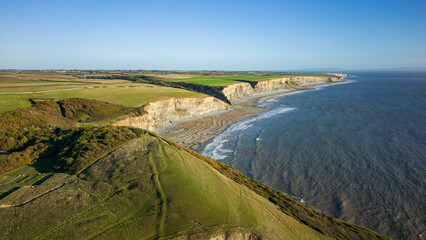 Naklejka premium Aerial view of the limestone cliffs and beach at Southerndown and Dunraven Bay in Wales