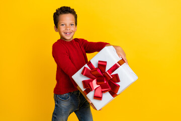 Photo portrait of charming little boy receive holiday new year gift wear trendy red knitwear...
