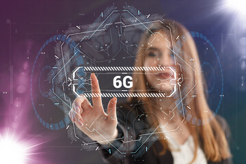 Business, Technology, Internet and network concept. Young businessman working on a virtual screen of the future and sees the inscription: 6G