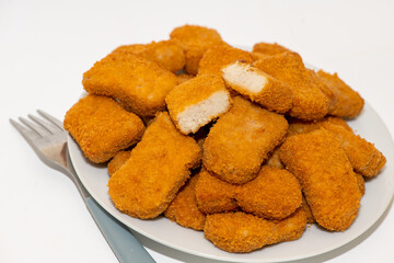 Fried chicken nuggets isolated on white background