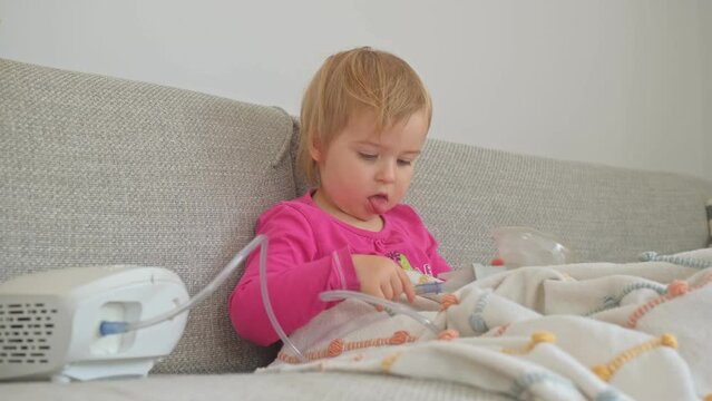 Adorable Caucasian Baby Girl Inhaling Medicine Steroids to Recover Respiratory Disease