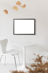 Fototapeta premium Clean minimal frame mockup on the white wall with table and chairs