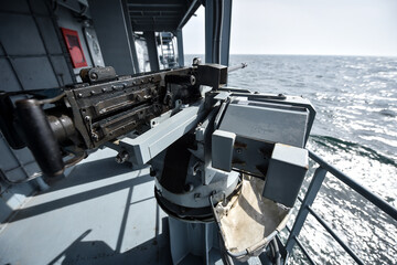 Big anti aircraft gun on a military ship 