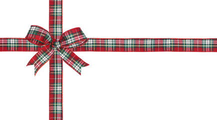 Red, green and white plaid Christmas gift bow and ribbon. Wrapped box layout isolated on a white background.