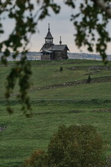 Ancient wooden chapel in autumn on Kizhi island