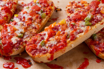 Pizza on a baguette, top view, close-up, no people, fast food, street food,