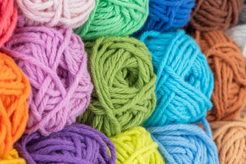 Set of colourful skein yarn as background