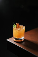 glass of orange juice with ice cocktail