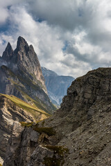 Clouds over mountain massif Odle in Dolomites