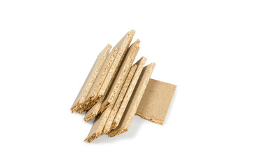 a pile of broken untreated mdf slabs of brown color on a white background close-up