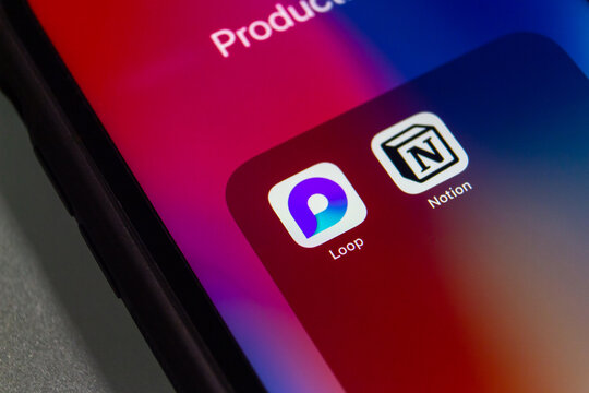 Vancouver, CANADA - Nov 4 2022 : Icons of Microsoft Loop (as part of Microsoft 365) and Notion App on an iPhone screen. Task management and collaboration platform app concept.