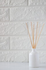 The aroma reed diffuser with the stick perfume are decorated in the room minimal design idea