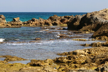 Rocks on the shores of the Mediterranean Sea in northern Israel.